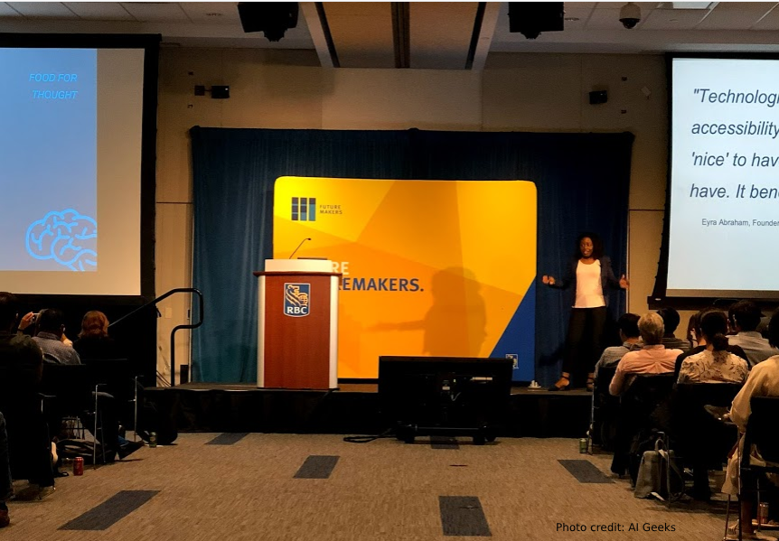 Eyra Abraham speaking on stage at AI Geeks - photo credit - AI Geeks